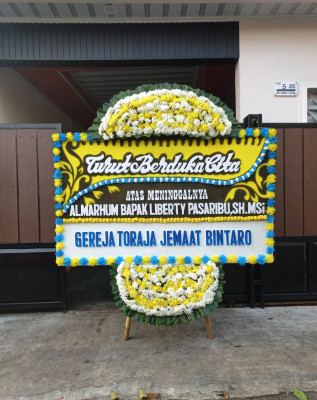 Papan Bunga Duka di Brumbungan